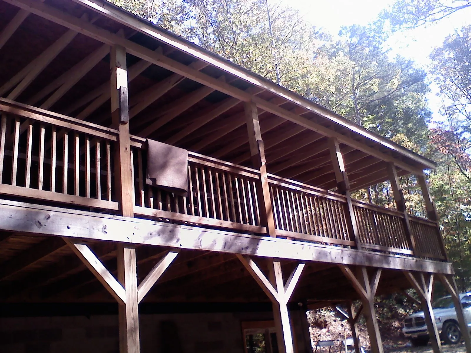 Timber framing under a new elevated porch and deck — Roof Leak Repair in Omaha by Roofing Brothers